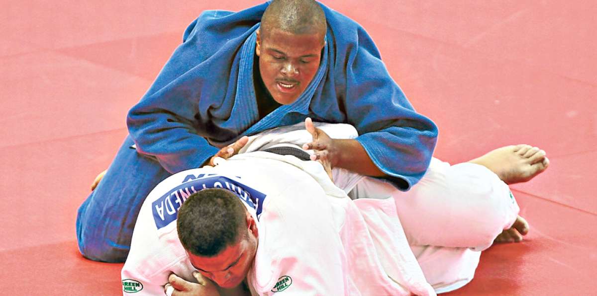 Freddy Figueroa (arriba) fue uno de los 3 medallistas de bronce que tuvo Ecuador en el Panamericano de Edmonton. Foto: Archivo / El Tel&eacute;grafo