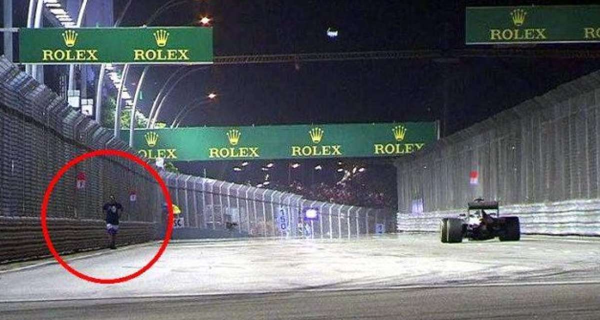 Hombre que salt&oacute; a pista en GP de Singapur, acusado de "comportamiento peligroso"