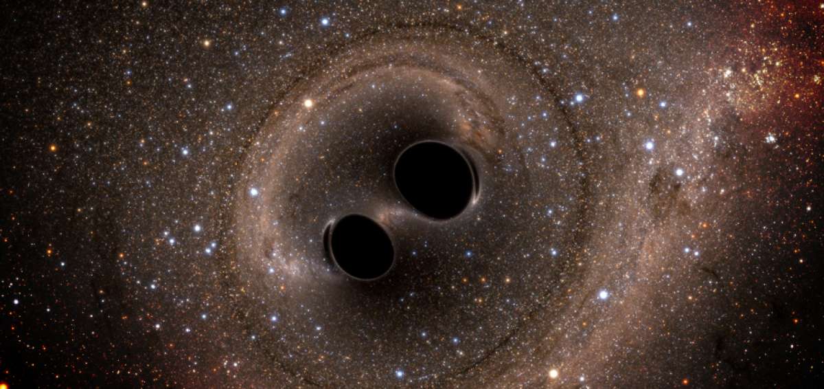 Momento en que colisionan los agujeros negros para producir el fen&oacute;meno de las ondas gravitacionales.
