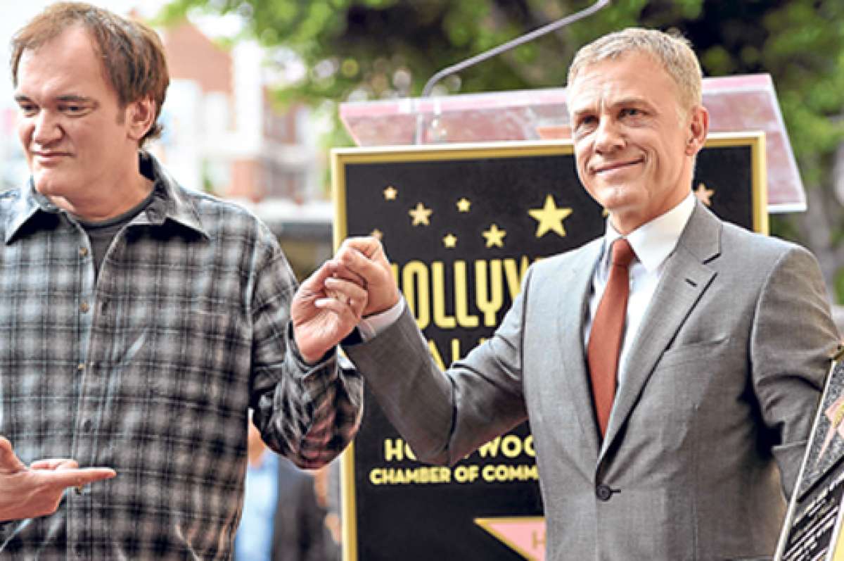 Christoph Waltz junto al c&eacute;lebre director Quentin Tarantino, quien lo hizo famoso por Bastardos sin gloria. Foto: AFP