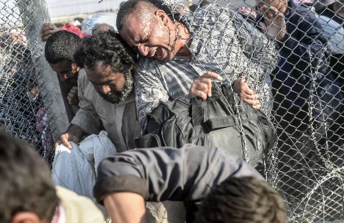 Las im&aacute;genes ganadoras retratan la situaci&oacute;n de los refugiados en la frontera de Turqu&iacute;a con Siria en junio de 2015. Foto: AFP