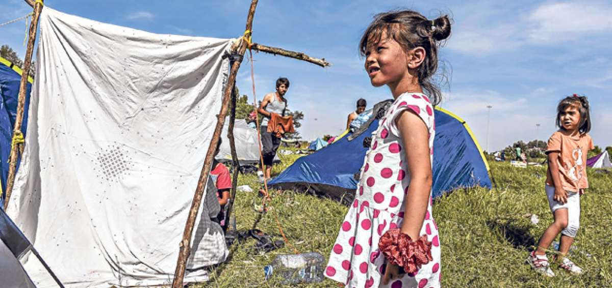 Miles de personas esperan una decisi&oacute;n de la UEpara otorgar los asilos en condiciones precarias. El flujo de migrantes llegar&iacute;a a los 350.000. Foto: AFP