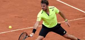 Wawrinka, Nishikori, Radwanska y Muguruza avanzan en Roland Garros