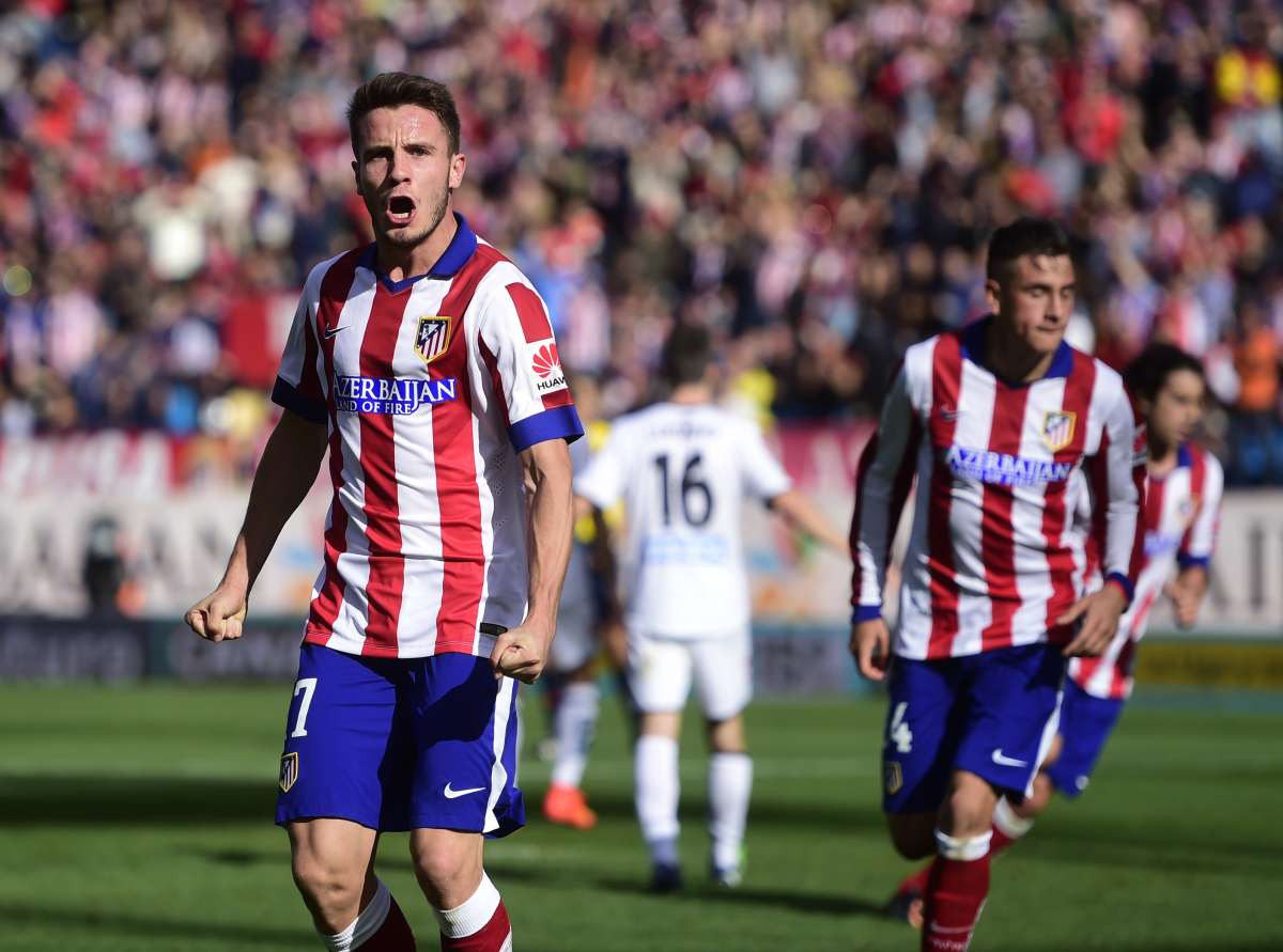 Sa&uacute;l &Ntilde;&iacute;guez (i.) fue el autor del primer gol del Atl&eacute;tico ante el Deportivo. Foto: AFP