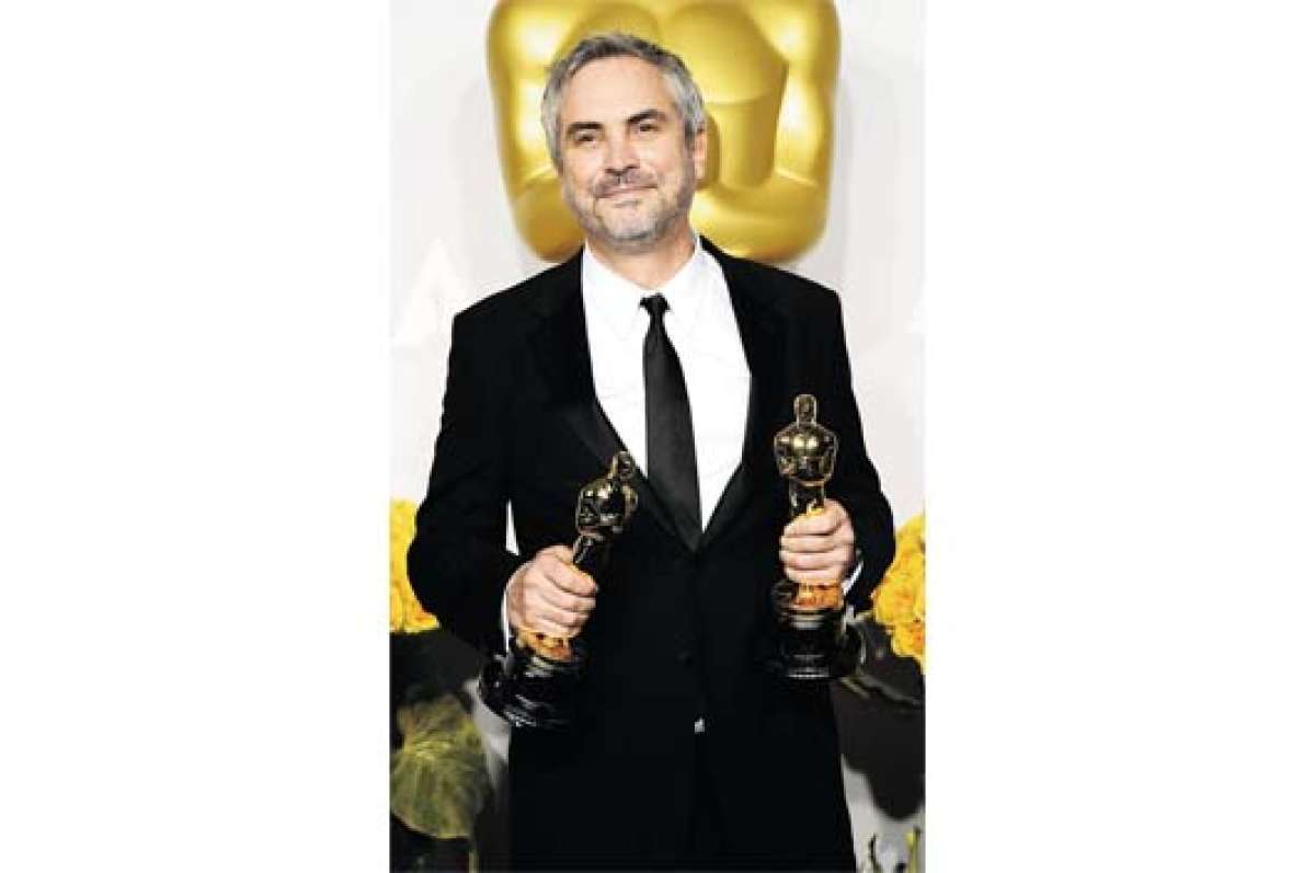El mexicano Alfonso Cuar&oacute;n entr&oacute; a la historia de los Oscar al ganar el premio como mejor director por su pel&iacute;cula &lsquo;Gravity&rsquo;.