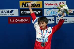 Kim Kuk-hyang celebra tras ganar la medalla de oro. FOTO: AFP