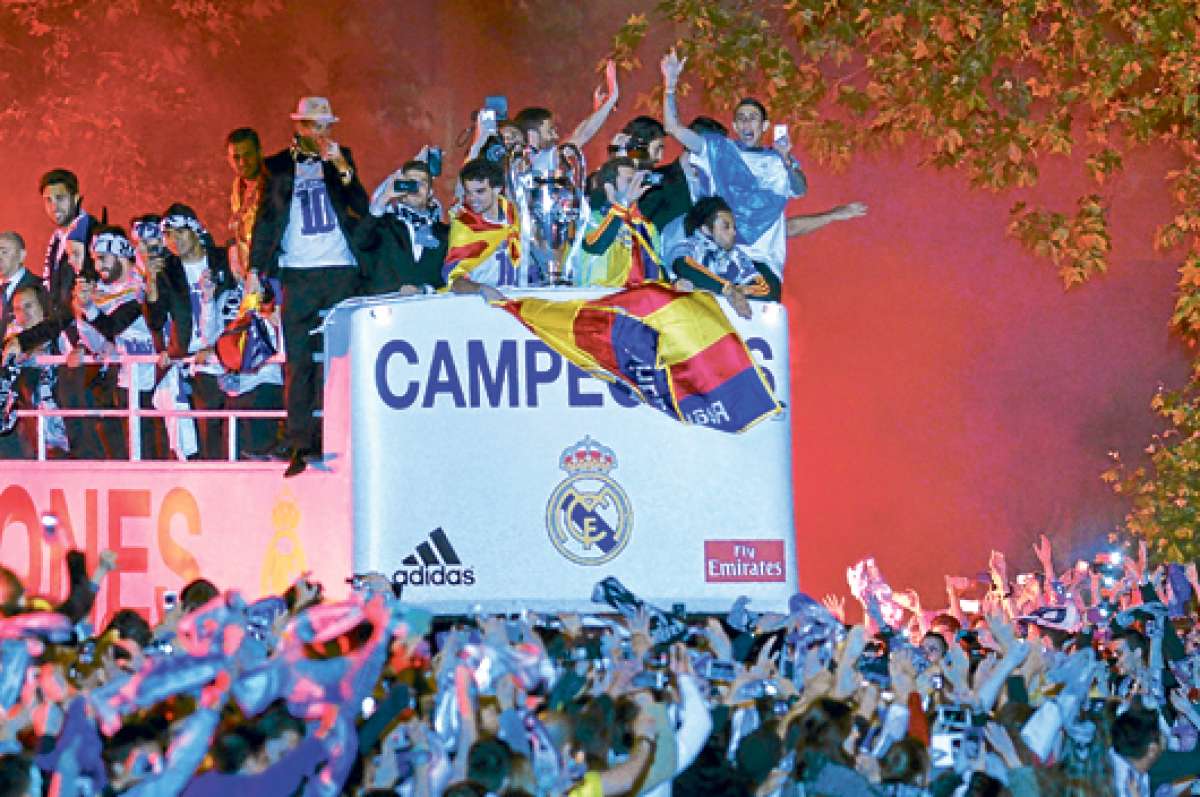 Los campeones y la &lsquo;Orejona&rsquo; fueron recibidos con j&uacute;bilo en la capital espa&ntilde;ola. Foto: AFP.