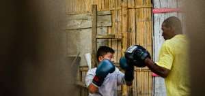 En 2015 Yecson &lsquo;El Destructor&rsquo; Preciado empez&oacute; a dar clases de boxeo en la sala de su casa, en la Isla Trinitaria. Luego gestiona la creaci&oacute;n del &lsquo;Trinibox&rsquo;.  