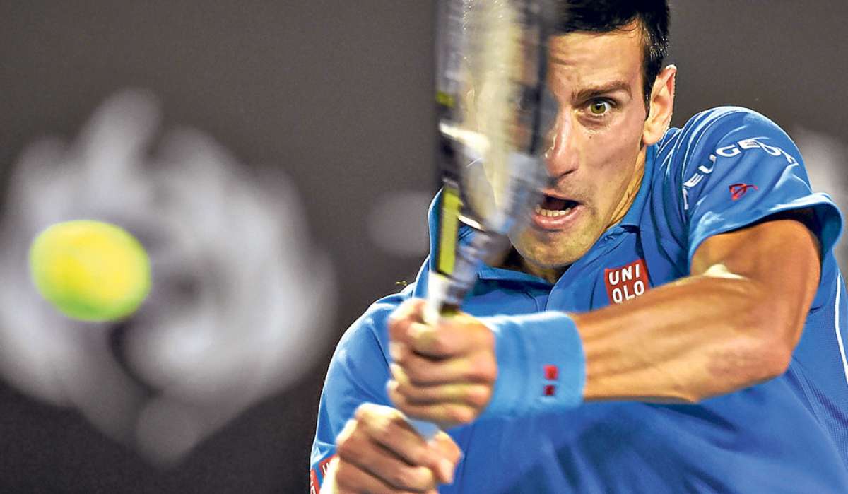 Djokovic, el m&aacute;ximo favorito, sell&oacute; su victoria en su segundo punto de partido, corriendo hacia la red con un preciso tiro que Murray no pudo devolver. Foto: AFP