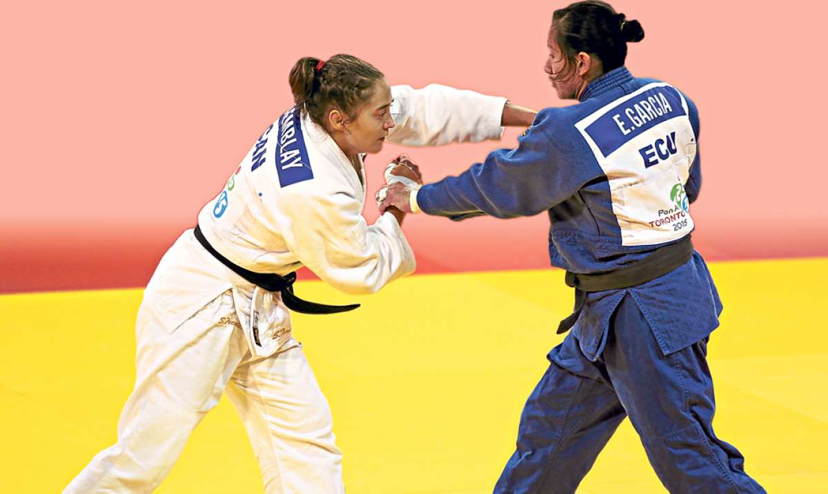 El 13 de este mes la portovejense Estefan&iacute;a Garc&iacute;a (d), de 27 a&ntilde;os, conquist&oacute; la medalla de oro de los Juegos Panamericanos luego de someter a la canadiense St&eacute;fanie Tremblay (i).