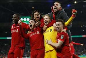 Los jugadores del Liverpool celebran su pase a las semifinales de la Liga de Campeones