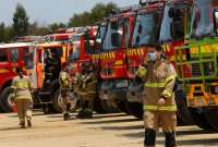 Los bomberos acudieron al incendio en la localidad de Coronel, en el sur de Chile. 